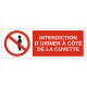 Panneau interdiction d'uriner à coté de la cuvette