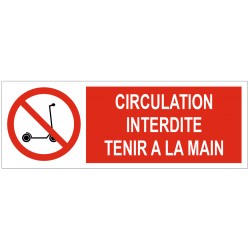 Panneau circulation interdite tenir à la main